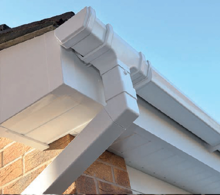 White fascia, soffit with squareline gutter Roofline by Classic Stamford